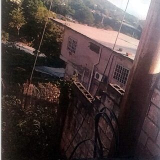 Two story house for sale.  Laventille