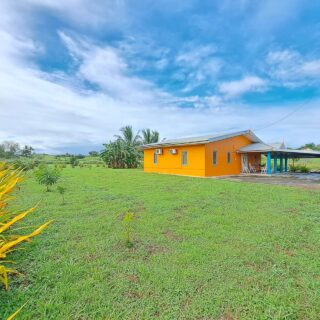 EXCELLENT DEAL, LARGE LAND AREA ; FULLY AIR CONDITIONED THREE(3) BEDROOM TWO(2) TOILET AND BATH HOUSE ON 1.33 ACRES OF LAND LOCATED IN SAN FRANCIQUE PENAL