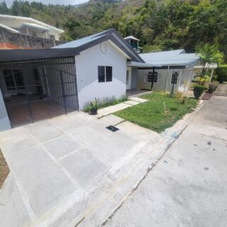 Small and MIGHTY sleek Maracas Valley, St. Joseph bungalow for SALE.