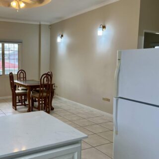 RECENTLY UPGRADED 2 BEDROOM, 1 BATHROOM SEMI-FURNISHED APARTMENT LOCATED IN WOODBROOK-GATED COMPOUND