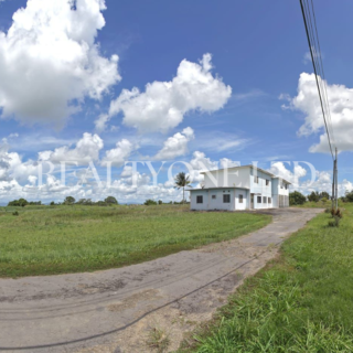 Prime Opportunity: Two-Story Home on 5.6 Acres of Freehold Land, Freeport Arena Road, Central Trinidad